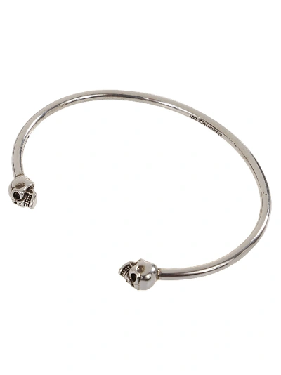 Shop Alexander Mcqueen Thin Twin Skull Bracelet In Silver