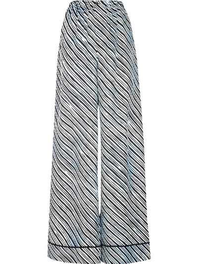 Shop Fendi X Joshua Vides Stripe Print Flared Trousers In Blue