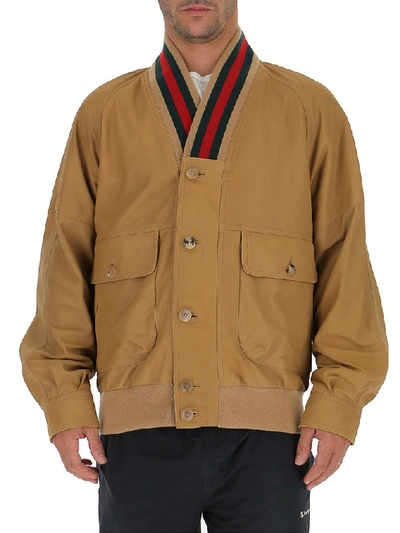 Shop Gucci Contrasting Trim Bomber Jacket In Beige