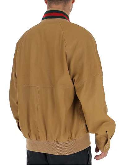 Shop Gucci Contrasting Trim Bomber Jacket In Beige