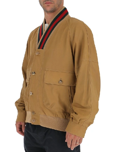 Shop Gucci Contrasting Trim Bomber Jacket In Beige