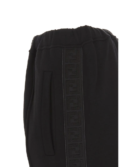 Shop Fendi Ff Motif Side Stripe Track Pants In Black