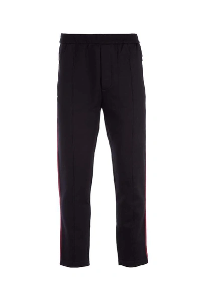 Shop Prada Side Stripe Pants In Black