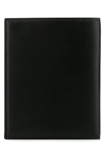 Shop Alexander Mcqueen Logo Bifold Passport Holder In Black