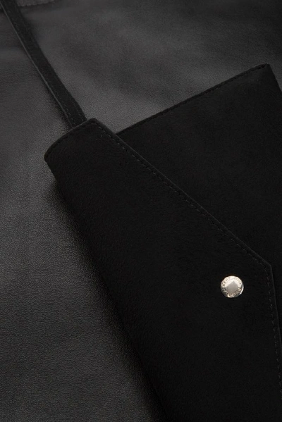 Shop Saint Laurent Logo Drawstring Backpack In Black