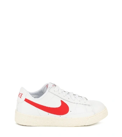 Shop Nike Blazer Sneakers In White