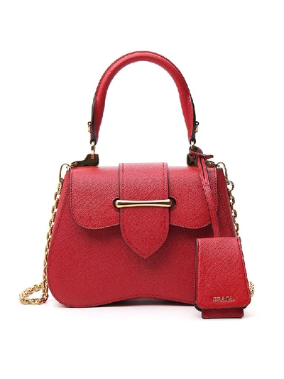 Shop Prada Sidonie Top Handle Bag In Red