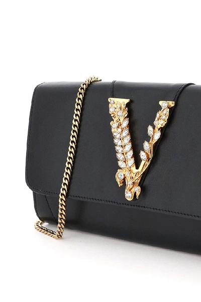 Shop Versace Virtus Embellished Chain Clutch Bag In Black