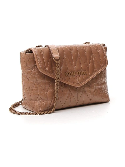 Shop Miu Miu Quilted Logo Shoulder Bag In Brown