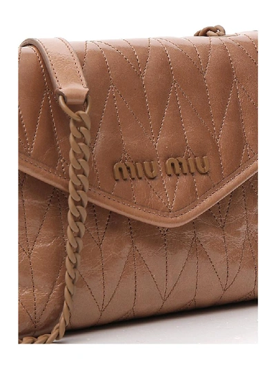 Shop Miu Miu Quilted Logo Shoulder Bag In Brown