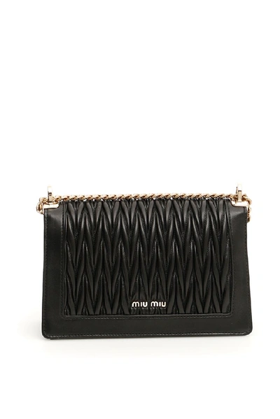 Shop Miu Miu Matelassé Chain Strap Shoulder Bag In Black