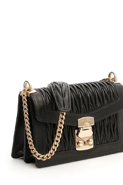 Shop Miu Miu Matelassé Chain Strap Shoulder Bag In Black