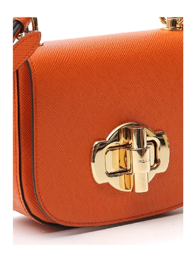 Shop Prada Lock Detail Shoulder Bag In Orange