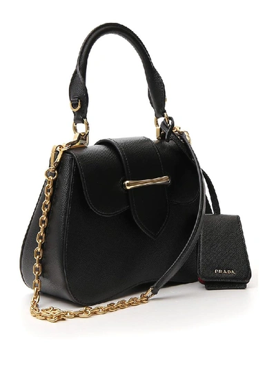 Shop Prada Sidonie Top Handle Bag In Black