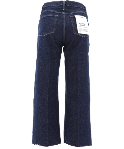 Shop Frame Ali Wide Crop Raw Edge Jeans In Blue