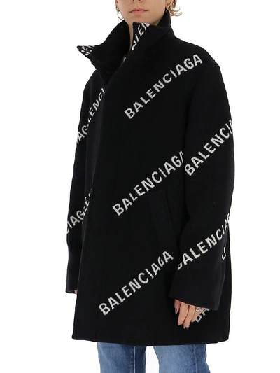 Shop Balenciaga Allover Logo Coat In Black