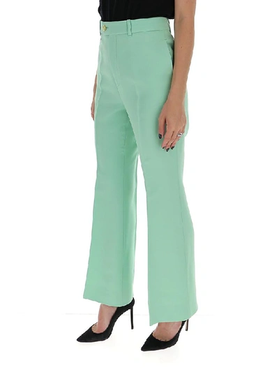 Shop Gucci Flared Pants In Green