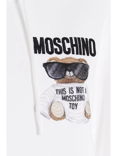 Shop Moschino Teddy Print Hoodie In White