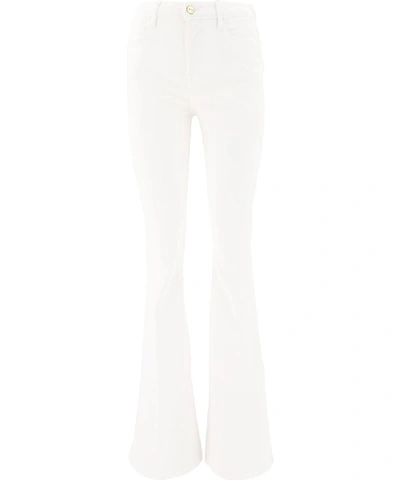 Shop Frame Le High Flare Jeans In White