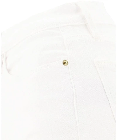 Shop Frame Le High Flare Jeans In White