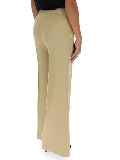Shop Theory Palazzo Trousers In Beige