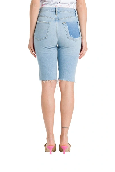 Shop Frame Raw Hem Denim Shorts In Blue