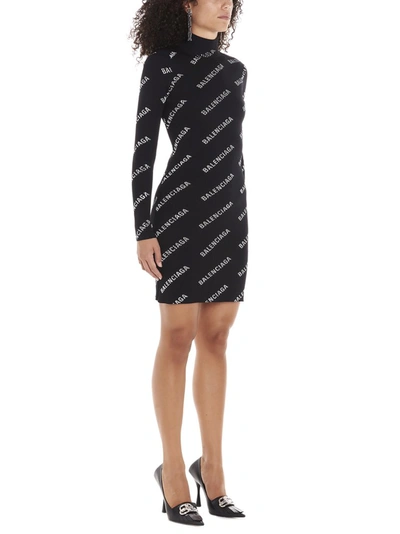 Shop Balenciaga All Over Logo Bodycon Dress In Black