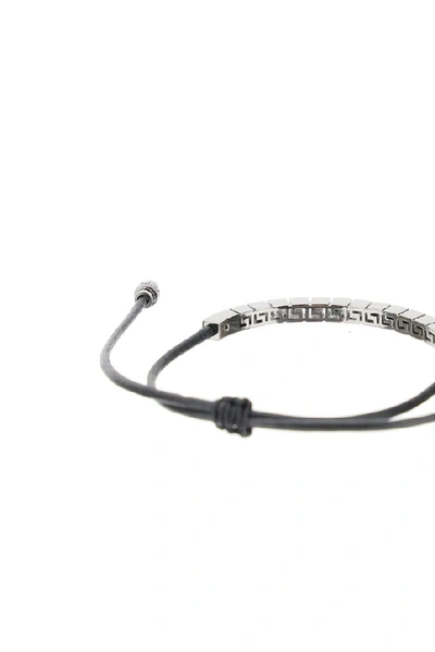 Shop Versace Greca Drawstring Bracelet In Silver