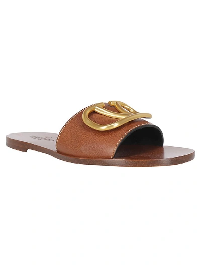 Shop Valentino Vlogo Slides In Brown