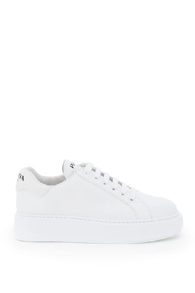 Shop Prada Logo Low Top Sneakers In White