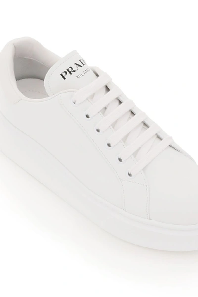 Shop Prada Logo Low Top Sneakers In White