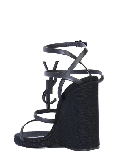 Shop Saint Laurent Cassandra Wedge Sandals In Black