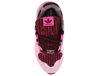 Shop Adidas Originals Zx Torsion Sneakers In Pink