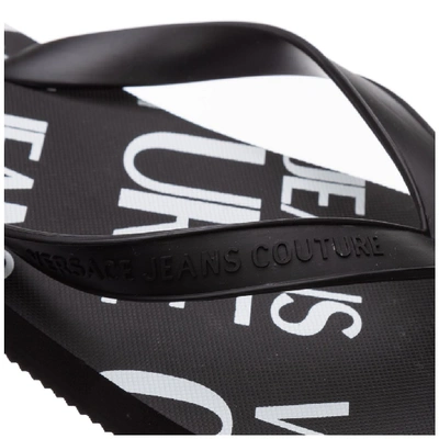 Shop Versace Jeans Couture Logo Embossed Flip Flops In Black