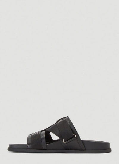 Shop Valentino Vltn Logo Sandals In Black