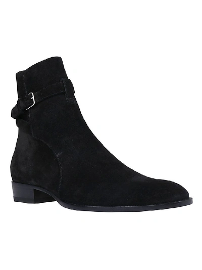 Shop Saint Laurent Wyatt Jodhpur Boots In Black