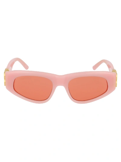 Shop Balenciaga Sunglasses In Pink Gold Red