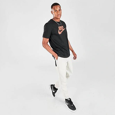 Shop Nike Tech Fleece Taped Jogger Pants In White