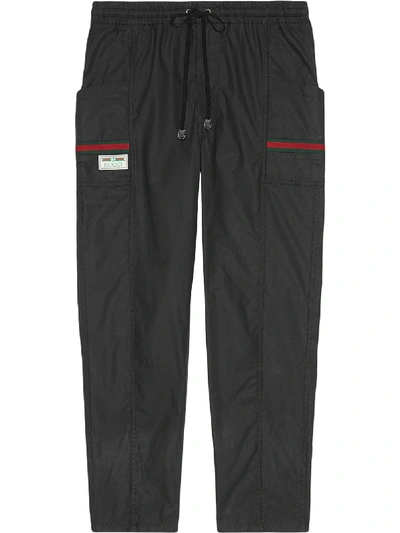 Shop Gucci Web-embellished Tapered Track Pants In Black