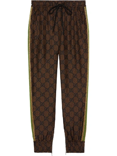 Shop Gucci Gg Supreme Silk Blend Trousers In Brown