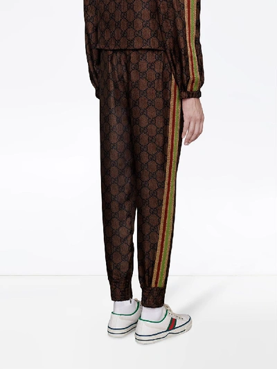 Shop Gucci Gg Supreme Silk Blend Trousers In Brown