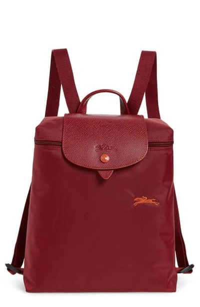 Shop Longchamp Le Pliage Club Backpack In Garnet Red