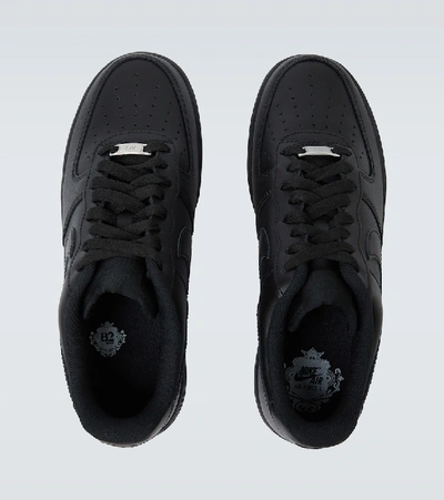 Shop Nike Air Force 1 '07 Sneakers In Black