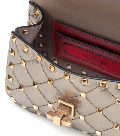 Shop Valentino Rockstud Spike Micro Leather Crossbody Bag In Metallic
