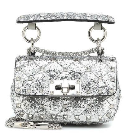 Shop Valentino Rockstud Spike Micro Glitter Crossbody Bag In Silver