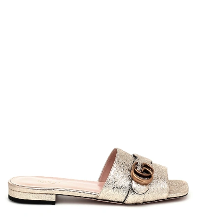 Shop Gucci Double G Metallic Leather Slides In Gold