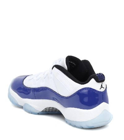 Shop Nike Air Jordan 11 Retro Low Sneakers In White