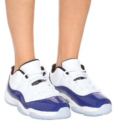 Shop Nike Air Jordan 11 Retro Low Sneakers In White