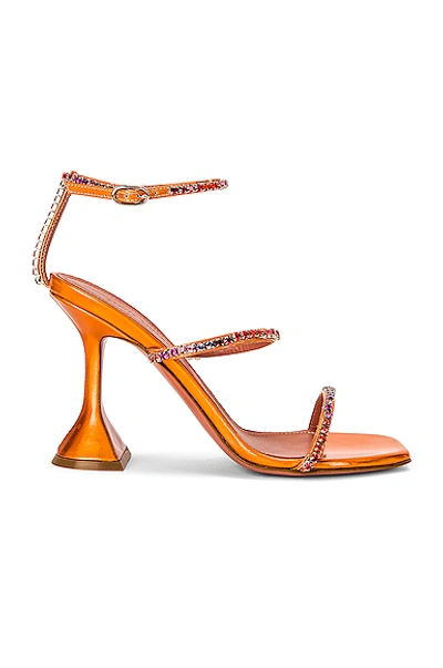 Shop Amina Muaddi Gilda Sandal In Orange Hologram & Sunset Rainbow