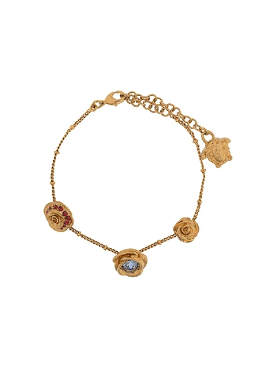 Shop Versace Medusa Floral Charm Bracelet In Gold